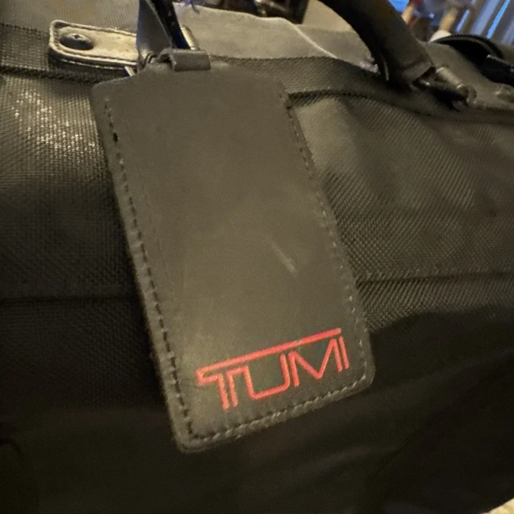 Tumi Alpha Black 4 Wheel Luggage 30x22x11